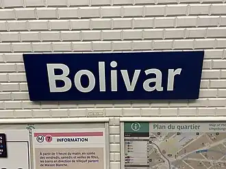 Plaque émaillée indiquant le nom de la station.