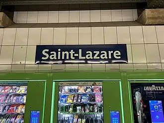 Plaque émaillée indiquant le nom de la station.