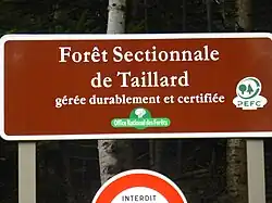 Panneau d'entrée de Taillard