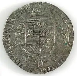 Revers d'un patagon aux armes d'Albert VII (1600-1621).