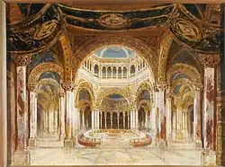 A building interior with many ornate arches. An altar under a dome is almost encircled by a table and a bench.