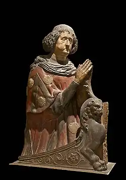 Sculpture polychrome en buste, mains jointes.