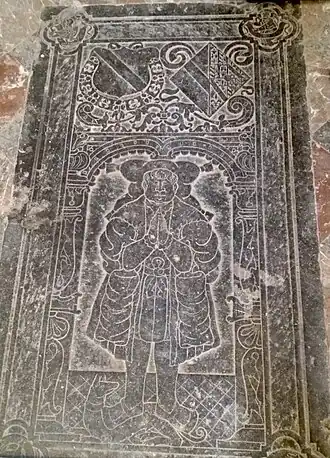 Dalle funéraire de Philippe, fils aîné de Jean et d'Anne (on y distingue les armes de son père, comte de Boussu et de sa mère).