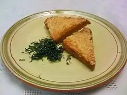 Toast de crevettes au sésame.