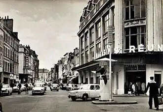 Ancien bâtiment des Magasins réunis de Cherbourg, situé à l'angle de la rue Gambetta et de la rue des Portes.