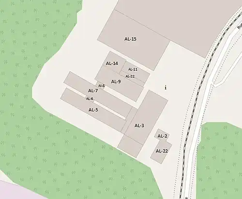 Plan avec les bâtiments qui sont situés à gauche de la rue, la plupart des bâtiments sont reliés entre eux.