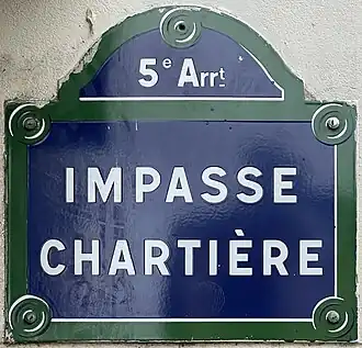 Voir la plaque.
