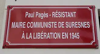 Photographie en couleur d'une plaque.