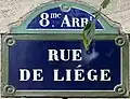 Plaque de la voie avec la graphie rue de Liége.