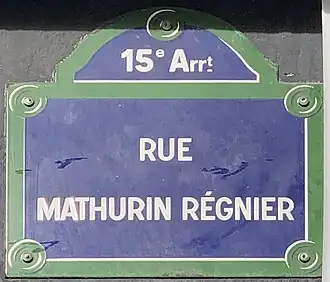 Voir la plaque.