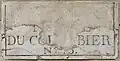 Ancienne plaque avec le nom de la rue du Colombier.