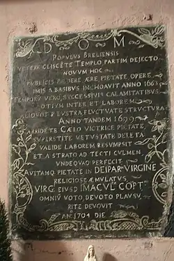 Plaque commémorant la reconstruction de l’église.