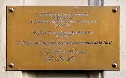 Plaque en mémoire de l'ancien monastère des Bénédictines fondé par Catherine de Bar au no 10.