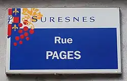 Photographie en couleur d'une plaque de rue.