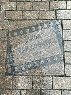 Plaque du film Jacob le menteur 1974, Potsdam, Brandenburger Straße.