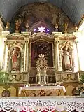 Le maître-autel et son retable.