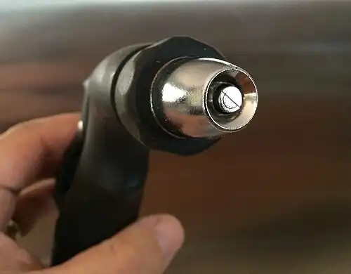 Ajutage d'un tuyau d'arosage