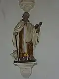 La statue de saint Antoine ermite.