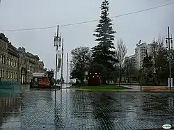 Pavés mouillés de la place