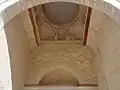 Vue intérieure de la partie supérieure, couverte d'une coupole sur trompes, du porche de Bab al-Gharbi.