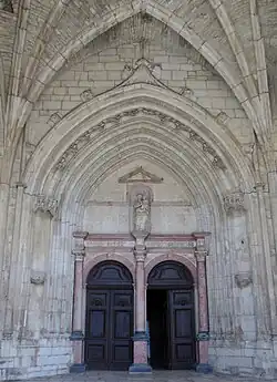 Portail ouest (1577), par Hugues le Rupt.