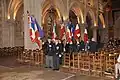 Porte-drapeaux dans l'église Saint-Pavin du Mans.
