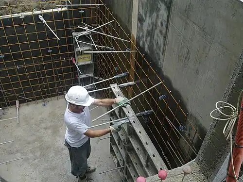 Pose de la 2e&nbsp;face de banche.