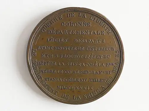 Revers avec texte commémoratif.