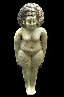 Statuette funéraire : « concubine du mort ». Terre cuite glaçurée. IIIe période intermédiaire, XXIIe dynastie.