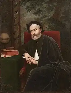 Professeur assis à sa table (autoportrait ?).