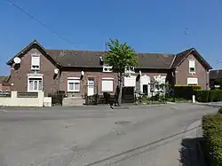 Des habitations groupées par quatre.