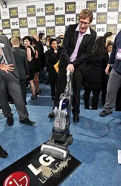 Description de l'image Ray McKinnon with the LG Electronics Kompressor Vacuum on 25th Spirit Awards Blue Carpet held at Nokia Theatre L.A. Live on March 5, 2010 in LA.jpg.