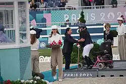 Remettant de médailles