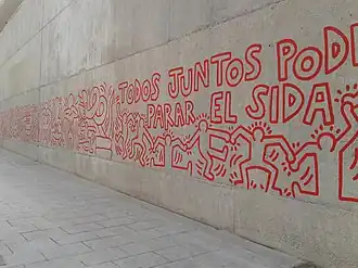 Reproduction de la fresque murale Together We Can Stop AIDS de Keith Haring (1989) à Barcelone.