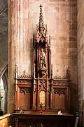 Le retable en bois sculpté de la chapelle Saint-Victor.