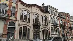 Au no&nbsp;15 : hôtel de Mademoiselle P. Eggerickx. Large hôtel particulier de trois travées et deux niveaux, de style éclectique, architecte Fernand Conard, 1911, bâtie pour le compte de Mlle P. Eggerickx.