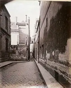 La vue vers la fin du XIXe siècle. On reconnait l'école élémentaire sur la gauche (photographie d'Eugène Atget)