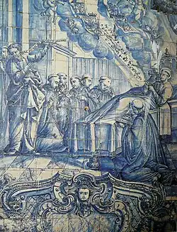 Photographie couleur d'un azulejo représentant la mort d'un religieux entouré de ses frères.