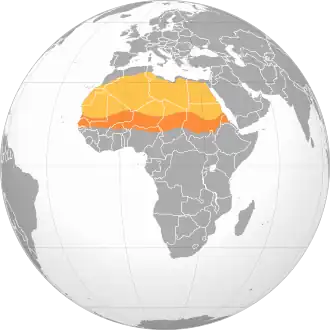 Carte de l'Afrique, avec le Sahara en beige et le Sahel en orange.