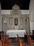 L'église paroissiale : autel de la Vierge et retable du croisillon nord.