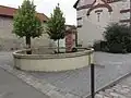 Fontaine à côté de l'église Saint-Gery d'Outre.