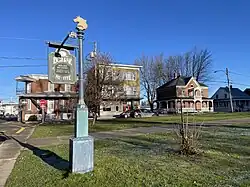 Panneau église catholique (rite latin), horaires des messes, rue Notre-Dame coin Saint-Paul.