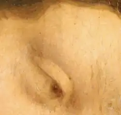 Gros plans sur l'œil droit et le front de la Vierge.