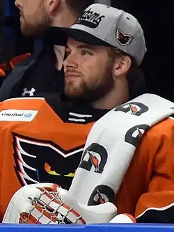 Photographie couleur d'un joueur de hockey sur glace