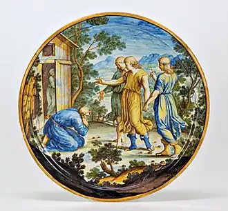 Assiette en majolique peinte avec Abraham et les trois anges, Ferdinando Maria Campani, San Quirico d'Orcia, milieu du XVIIIe&nbsp;siècle.