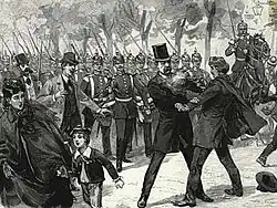 Cohen-Blind commet un attentat contre Bismarck, on le voit tirer sur le chancelier qui est coiffé d'un chapeau, les deux hommes se regardent dans les yeux