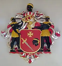 Blason de la Guilde des Têtes noires représentant saint Maurice, saint patron de la guilde.