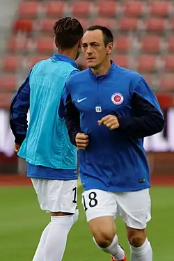 Photo de Laurent Dufresne, de trois-quart, en tenue de footballeur.