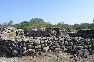 Photographie du village nuragique à Serra Orrios