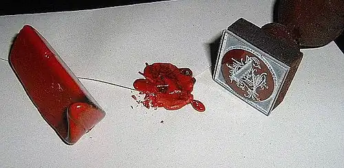 Seau imprimant de la cire.